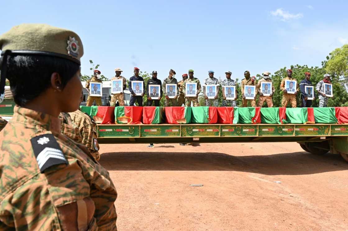 Toll: A funeral for 27 soldiers who were killed in an ambush in August as they escorted a large convoy of truck in the north of the country Toll: A funeral for 27 soldiers who were killed in an ambush in August as they escorted a large convoy of truck in the north of the country