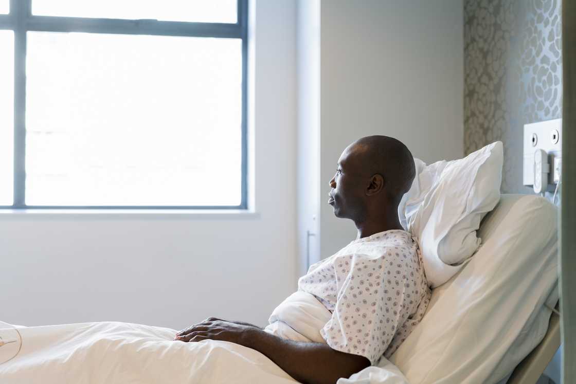 A man in a hospital bed