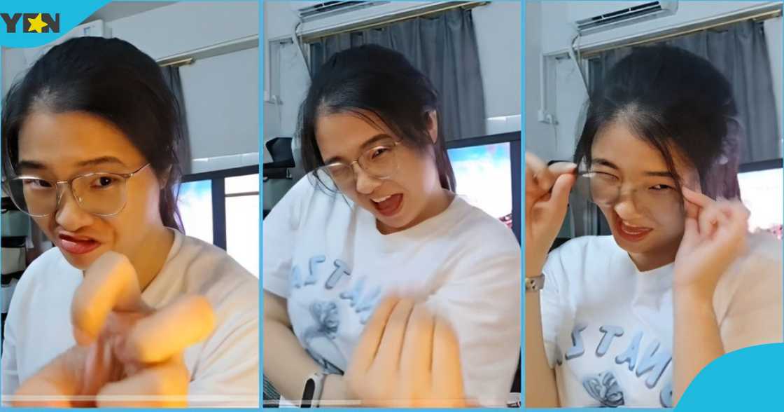 Photo of a Chinese lady singing with joy Photo of a Chinese lady singing with joy