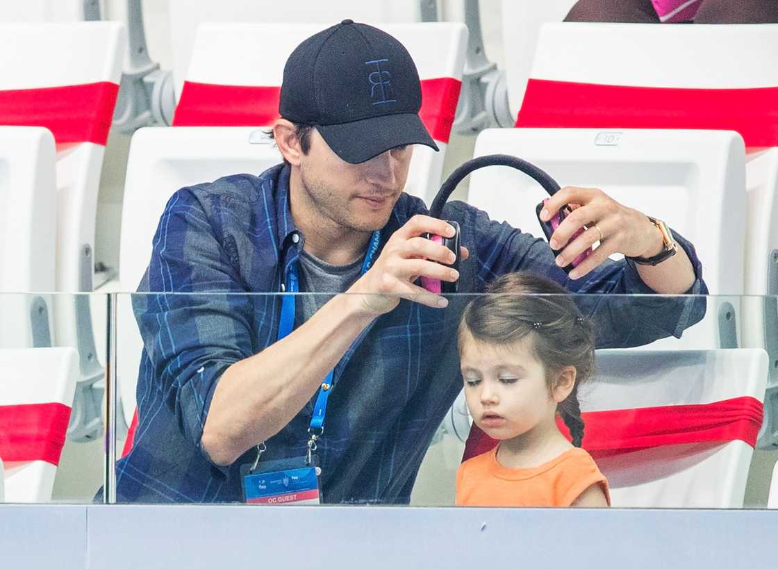 Ashton Kutcher (L) and his daughter Wyatt Isabelle (R)