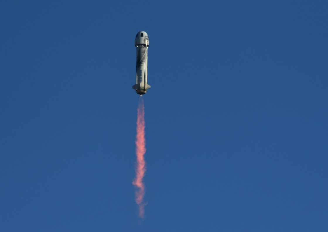 A Blue Origin New Shepard rocket launches from Launch Site One in West Texas north of Van Horn