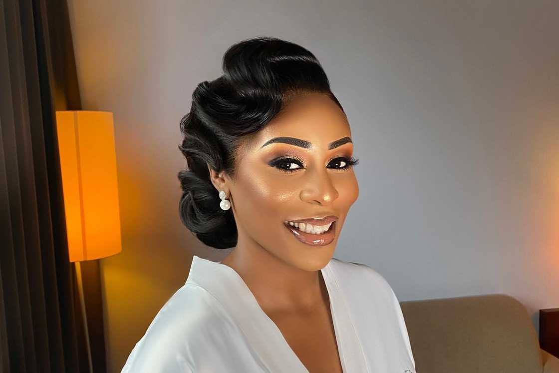 An Afrian-American lady is rocking the intage finger waves hairstyle An Afrian-American lady is rocking the intage finger waves hairstyle