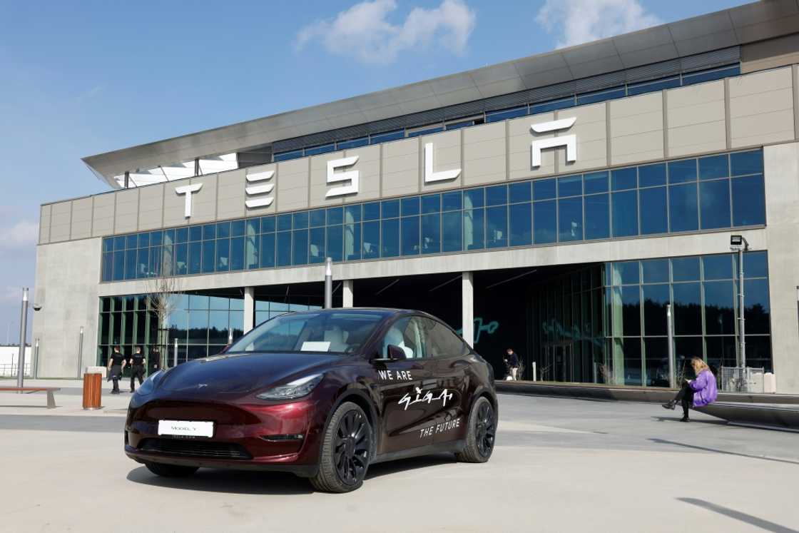 A Tesla Model Y in front of the company's plant near Berlin A Tesla Model Y in front of the company's plant near Berlin
