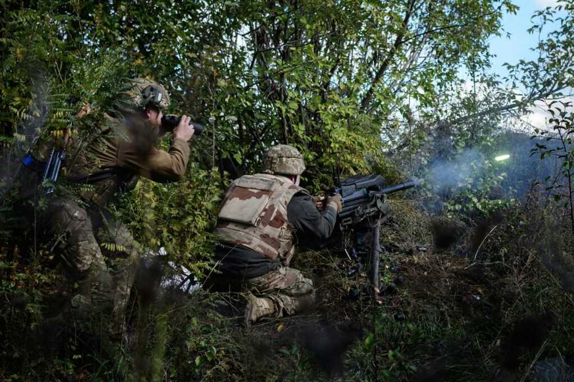 Soldier of Ukraine's 5th Regiment of Assault Infantry react after firing a US-made MK-19 automatic grenade launcher towards Russian positions in less than 800 metres away at a front line near Toretsk in the Donetsk region Soldier of Ukraine's 5th Regiment of Assault Infantry react after firing a US-made MK-19 automatic grenade launcher towards Russian positions in less than 800 metres away at a front line near Toretsk in the Donetsk region