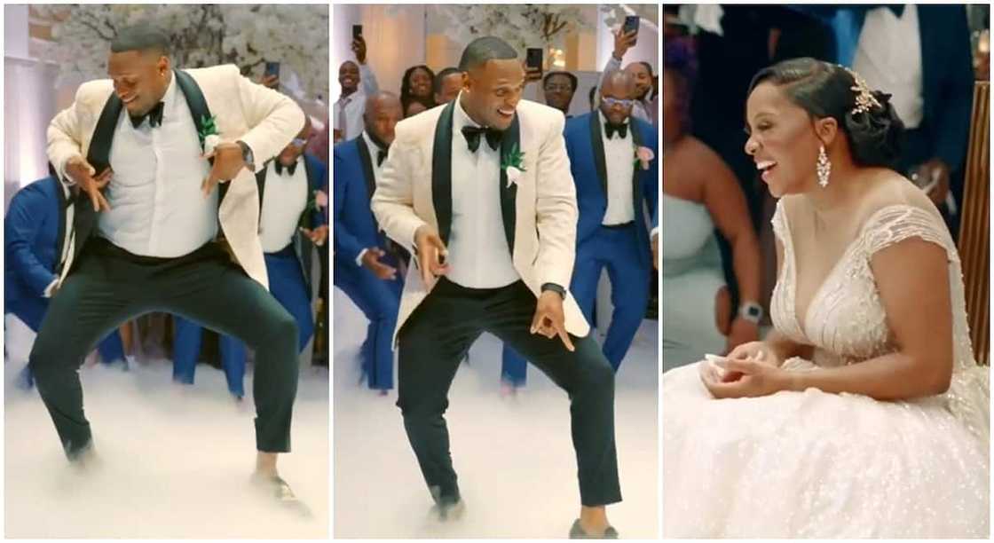 Groom dances with waist at his wedding.