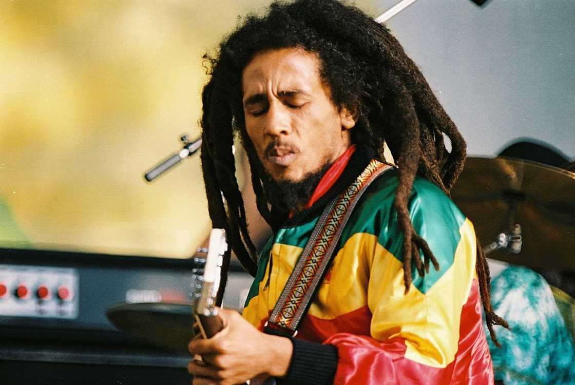 Bob Marley performs in a Reggae themed jacket in London. Bob Marley performs in a Reggae themed jacket in London.