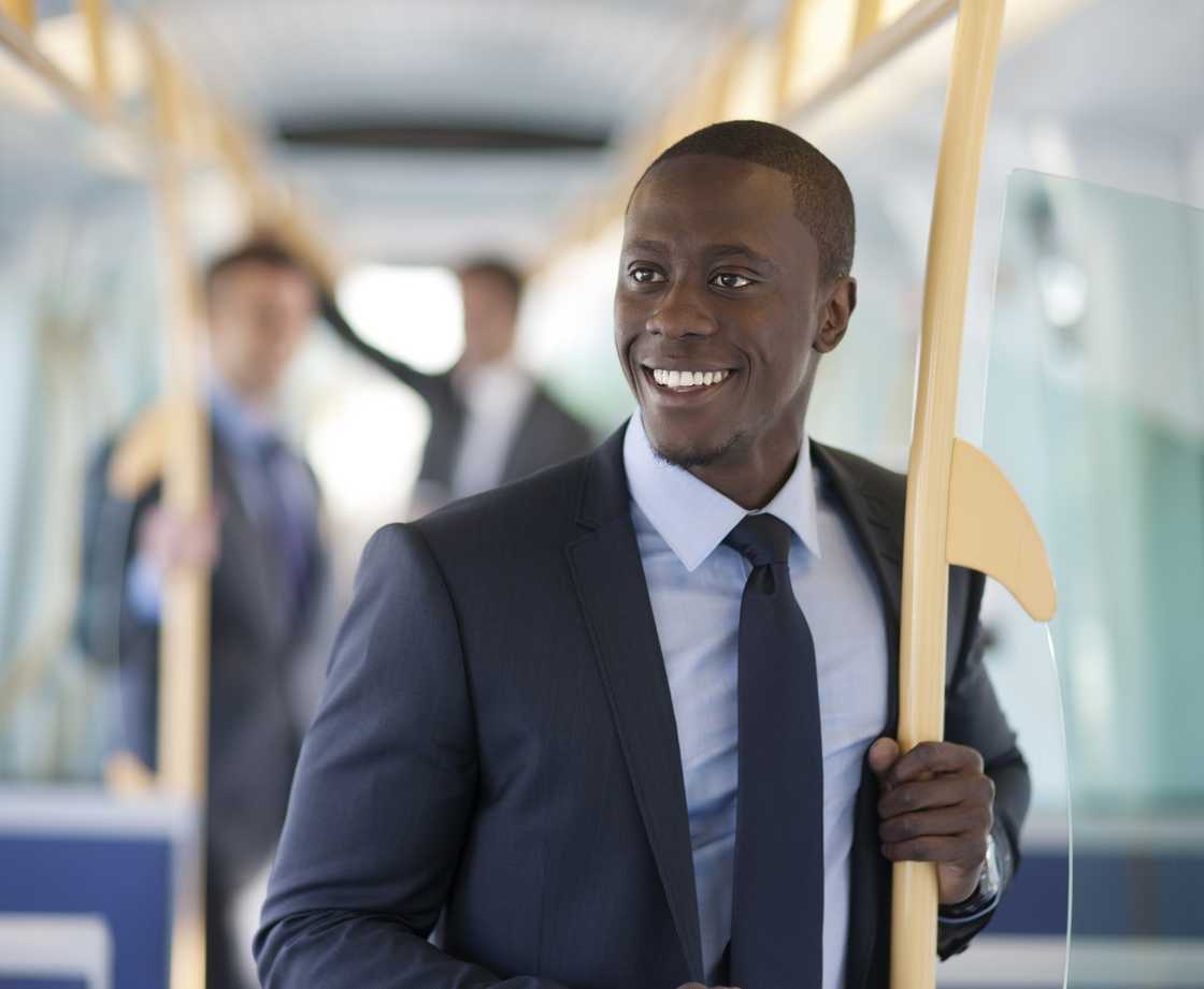 A man talking with someone in a vehicle A man talking with someone in a vehicle