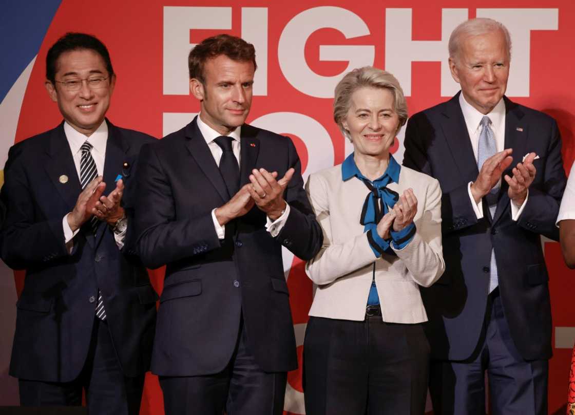 (L-R) Japanese Prime Minister Fumio Kishida, French President Emmanuel Macron, EU Commission President Ursula von der Leyen and US President Joe Biden applaud at the Global Fund's Seventh Replenishment Conference in New York (L-R) Japanese Prime Minister Fumio Kishida, French President Emmanuel Macron, EU Commission President Ursula von der Leyen and US President Joe Biden applaud at the Global Fund's Seventh Replenishment Conference in New York