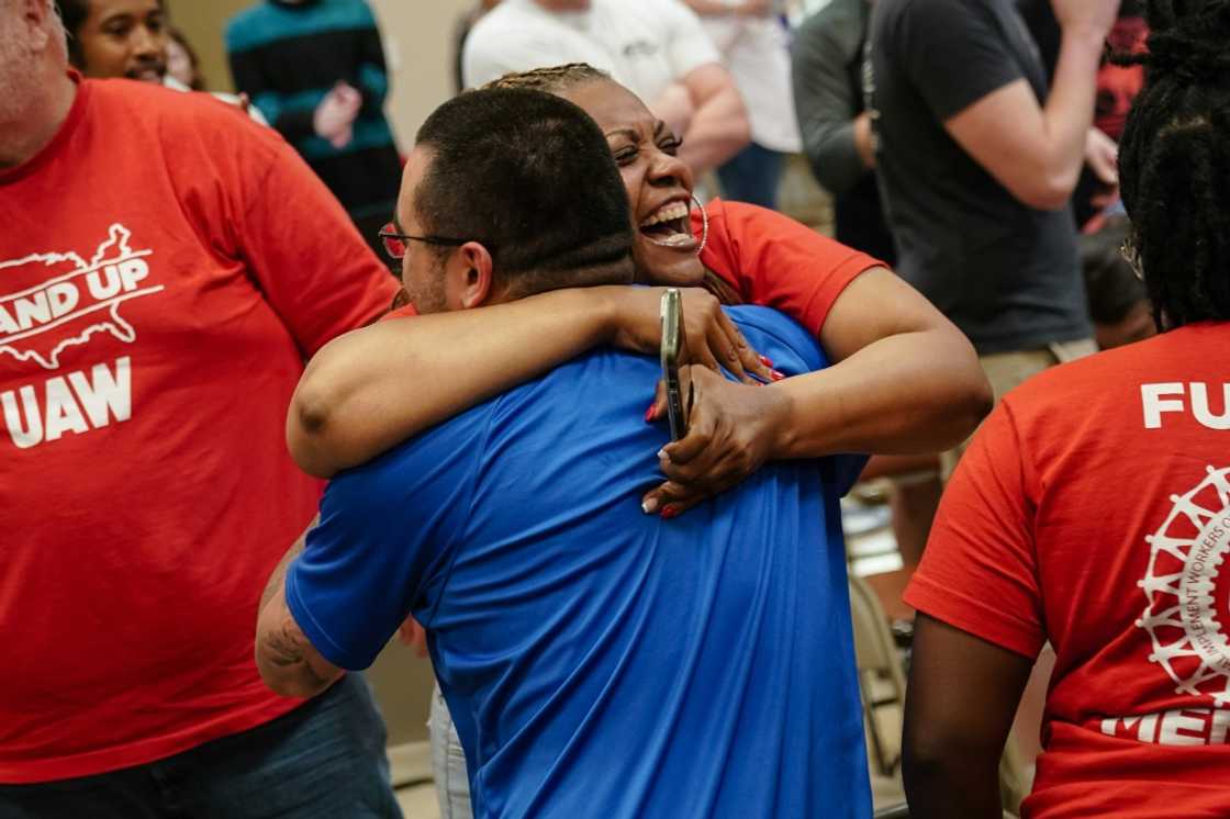 People celebrate after the United Auto Workers (UAW) received enough votes to form a union at a UAW vote watch party on April 19, 2024 in Chattanooga, Tennessee