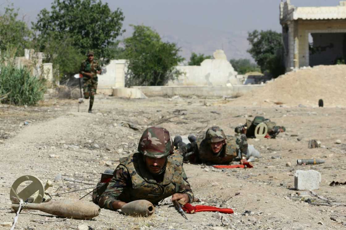 Syrian soldiers take part in a training session to remove and neutralise unexploded ordnance near the capital Damascus Syrian soldiers take part in a training session to remove and neutralise unexploded ordnance near the capital Damascus