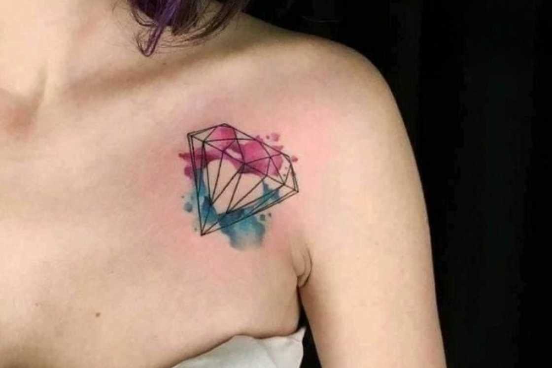 A coloured diamond shoulder blade tattoo A coloured diamond shoulder blade tattoo