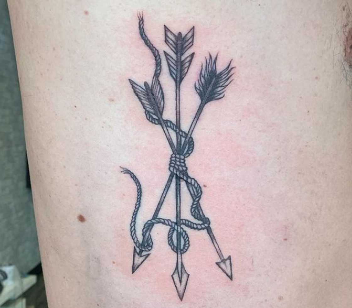 Three arrows down tattoo