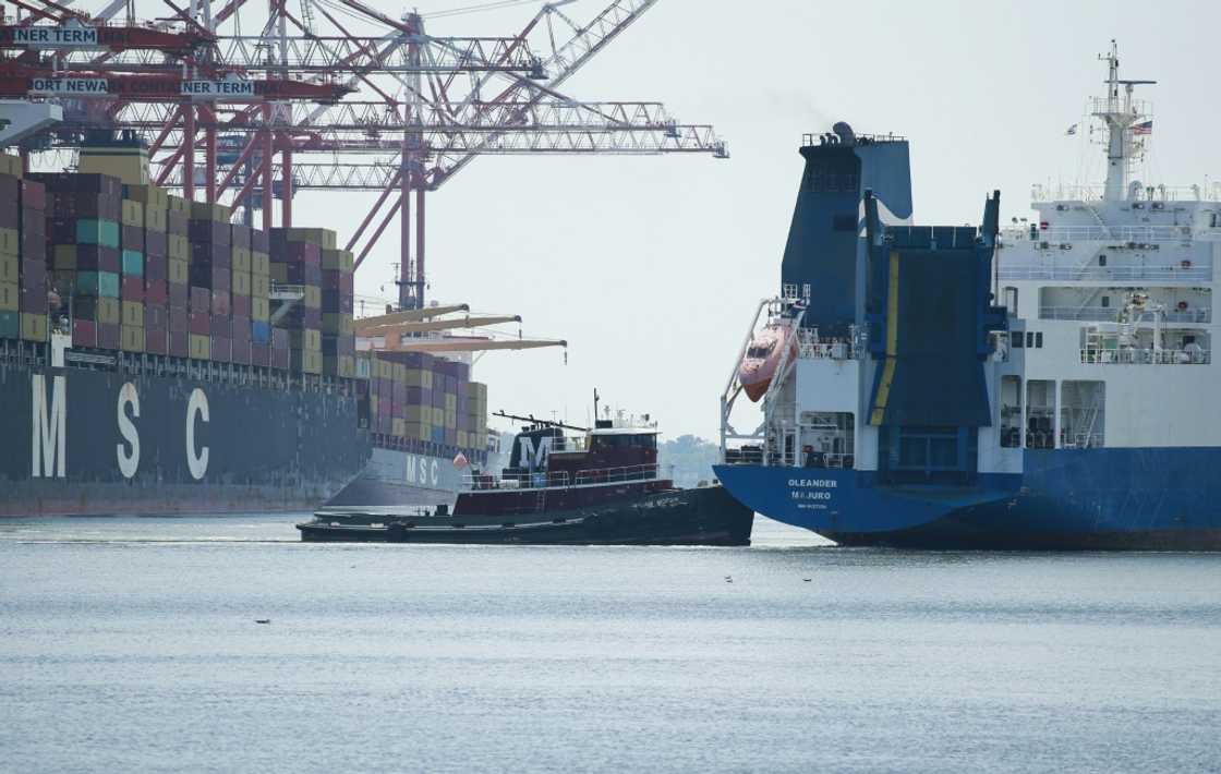 A ship departs from the Port Newark container terminal in Newark, New Jersey on July 21, 2022