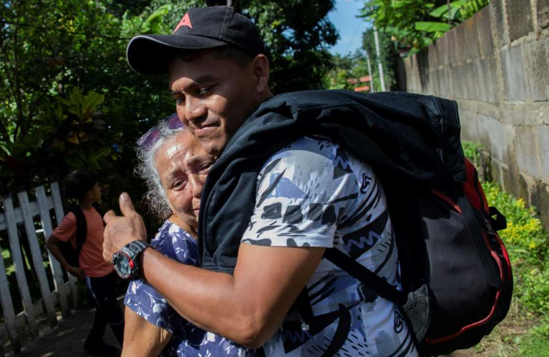Moises Espinoza hugs his grandmother before leaving Nicaragua in a bid to reach the United States alongside his counsin Jose Galeano Moises Espinoza hugs his grandmother before leaving Nicaragua in a bid to reach the United States alongside his counsin Jose Galeano