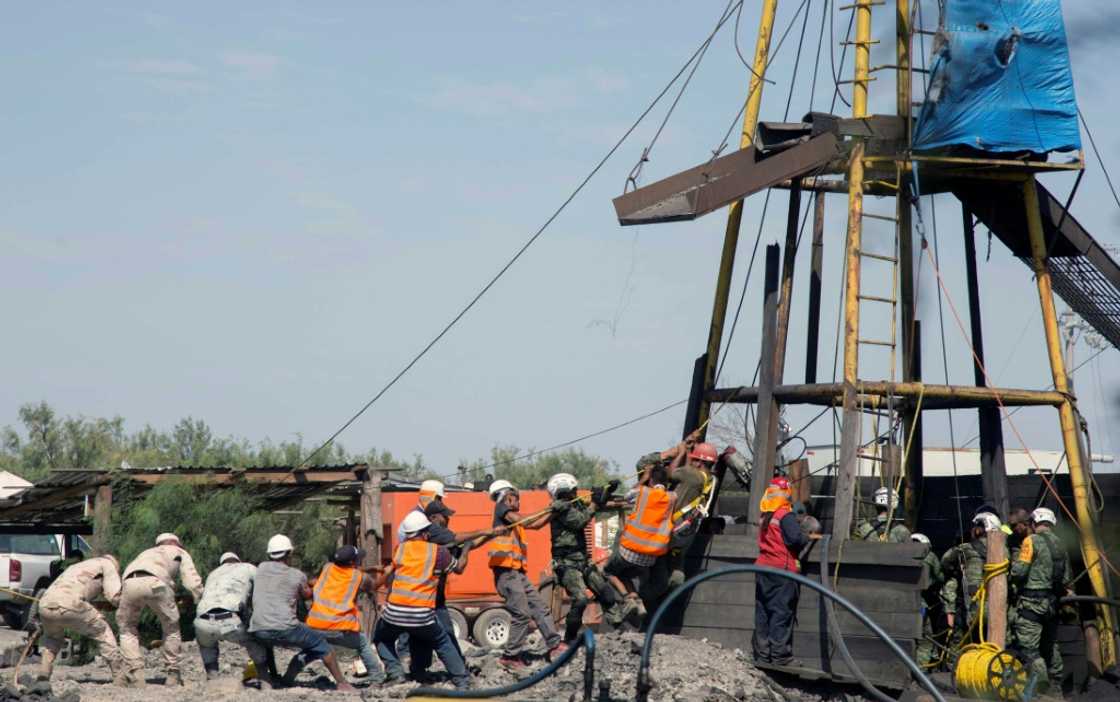 Rescuers work at a coal mine in northern Mexico where 10 people are trapped Rescuers work at a coal mine in northern Mexico where 10 people are trapped