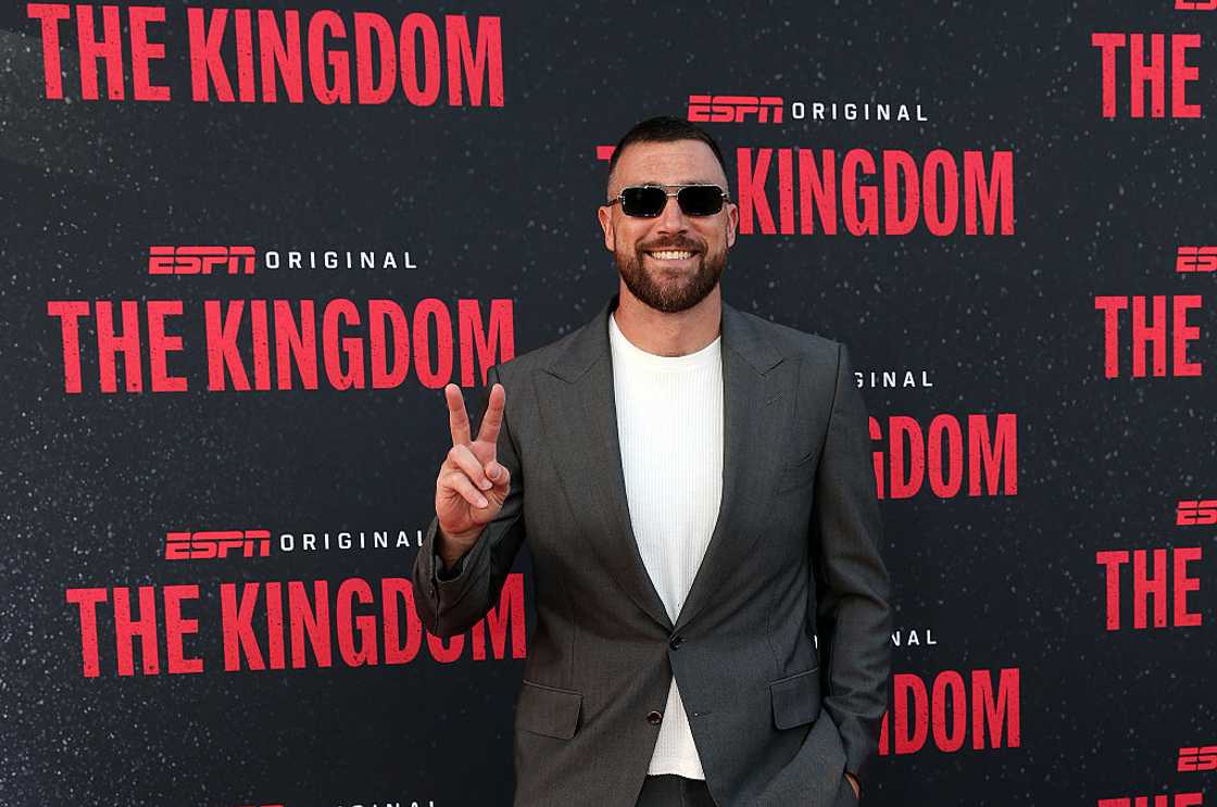 Travis Kelce poses on the red carpet upon arrival for "The Kingdom" screening Travis Kelce poses on the red carpet upon arrival for "The Kingdom" screening