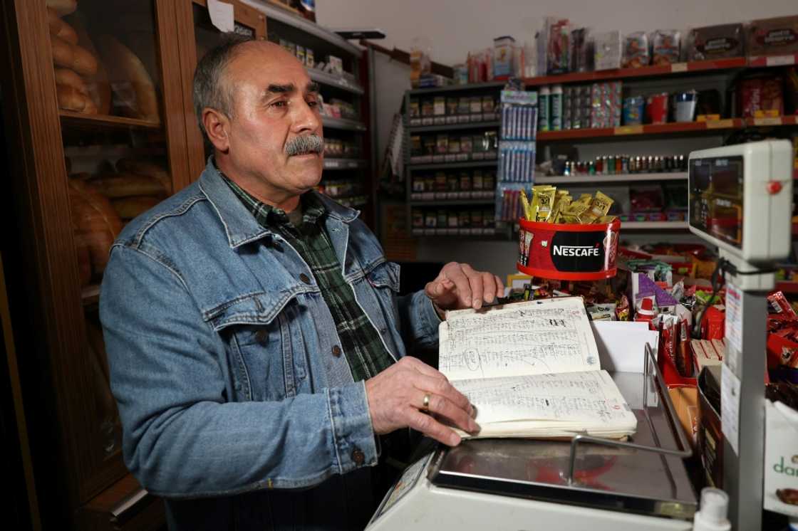 Grocers are using ledgers to write down debts owed by locals during Turkey's economic crisis