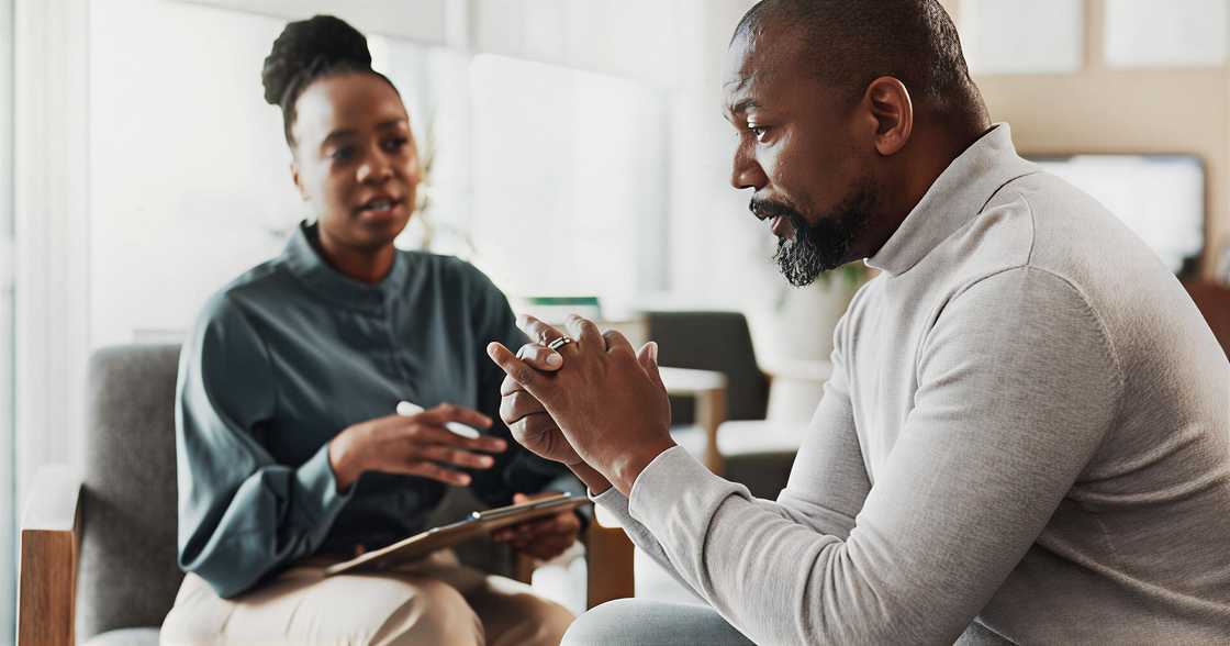 A man and woman talking