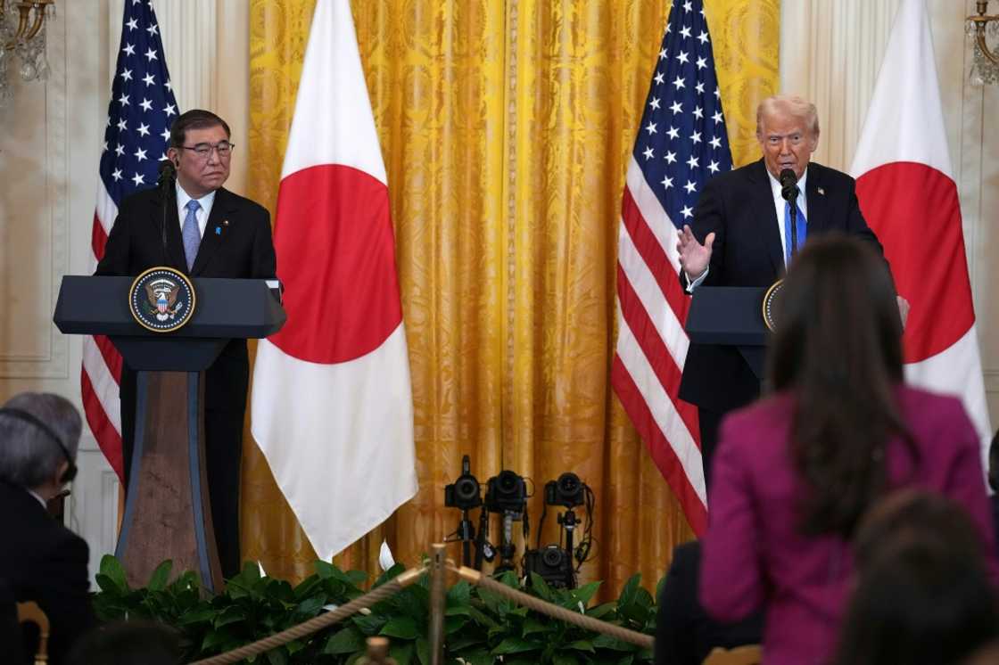 Japanese Prime Minister Shigeru Ishiba (L) met Donald Trump at the White House last month Japanese Prime Minister Shigeru Ishiba (L) met Donald Trump at the White House last month