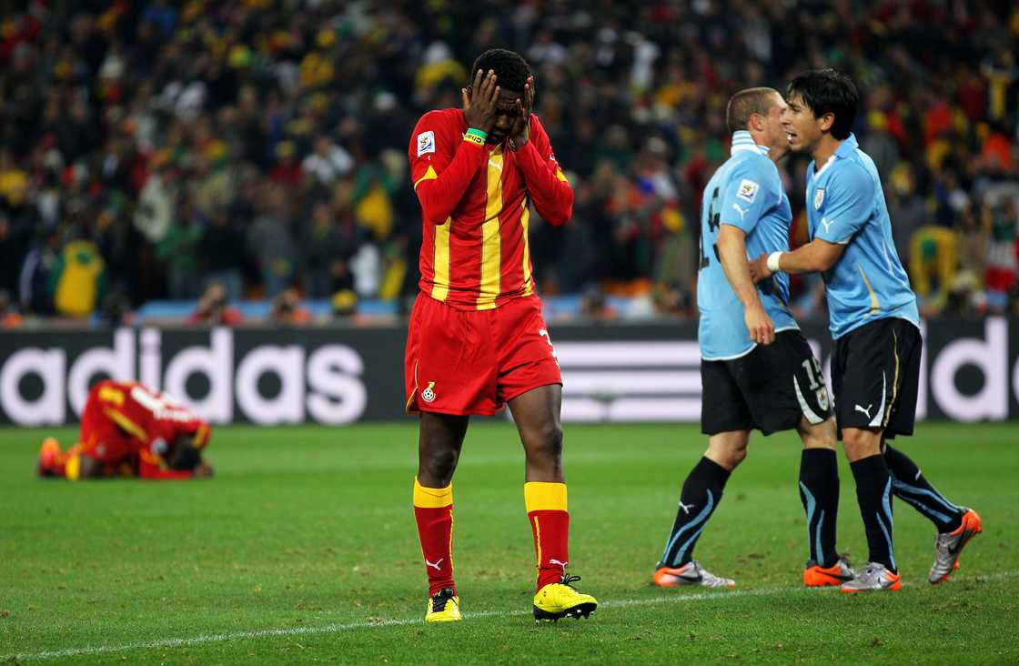 Asamoah Gyan of Ghana reacts as he misses a late penalty kick in extra time to win the match during the 2010 FIFA World Cup South Africa Quarter Final match between Uruguay and Ghana at the Soccer City stadium on July 2, 2010 in Johannesburg, South Africa Asamoah Gyan of Ghana reacts as he misses a late penalty kick in extra time to win the match during the 2010 FIFA World Cup South Africa Quarter Final match between Uruguay and Ghana at the Soccer City stadium on July 2, 2010 in Johannesburg, South Africa