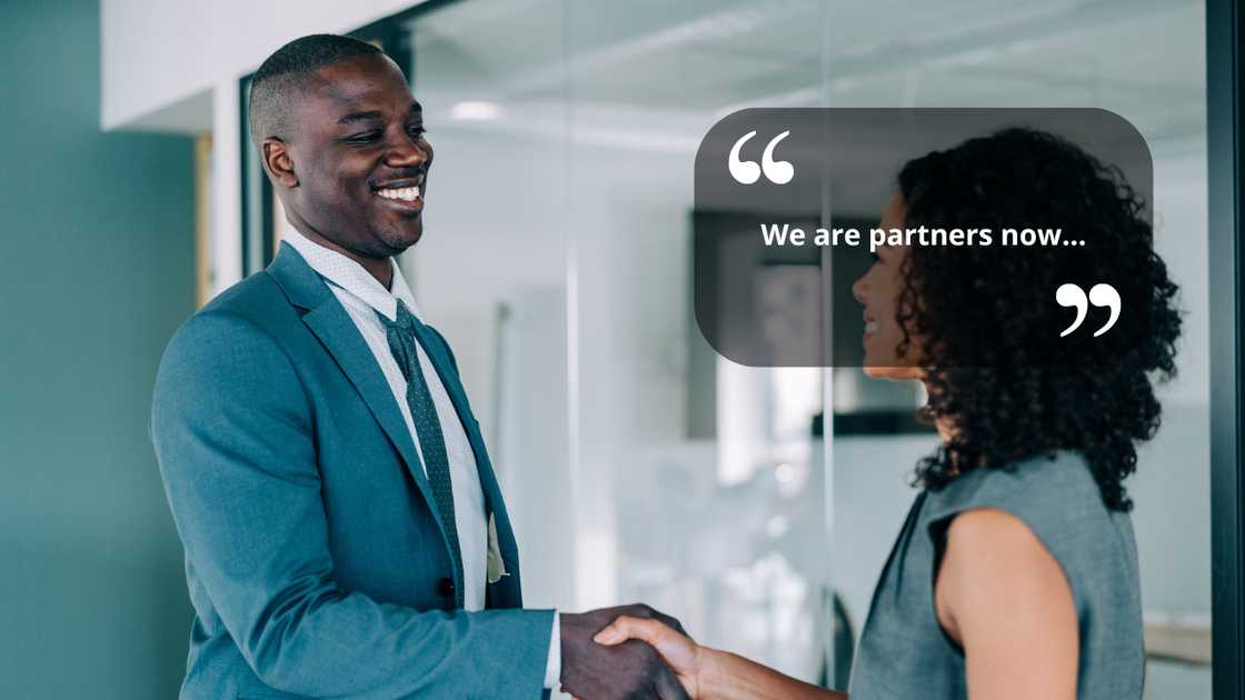 A man and woman shaking hands A man and woman shaking hands