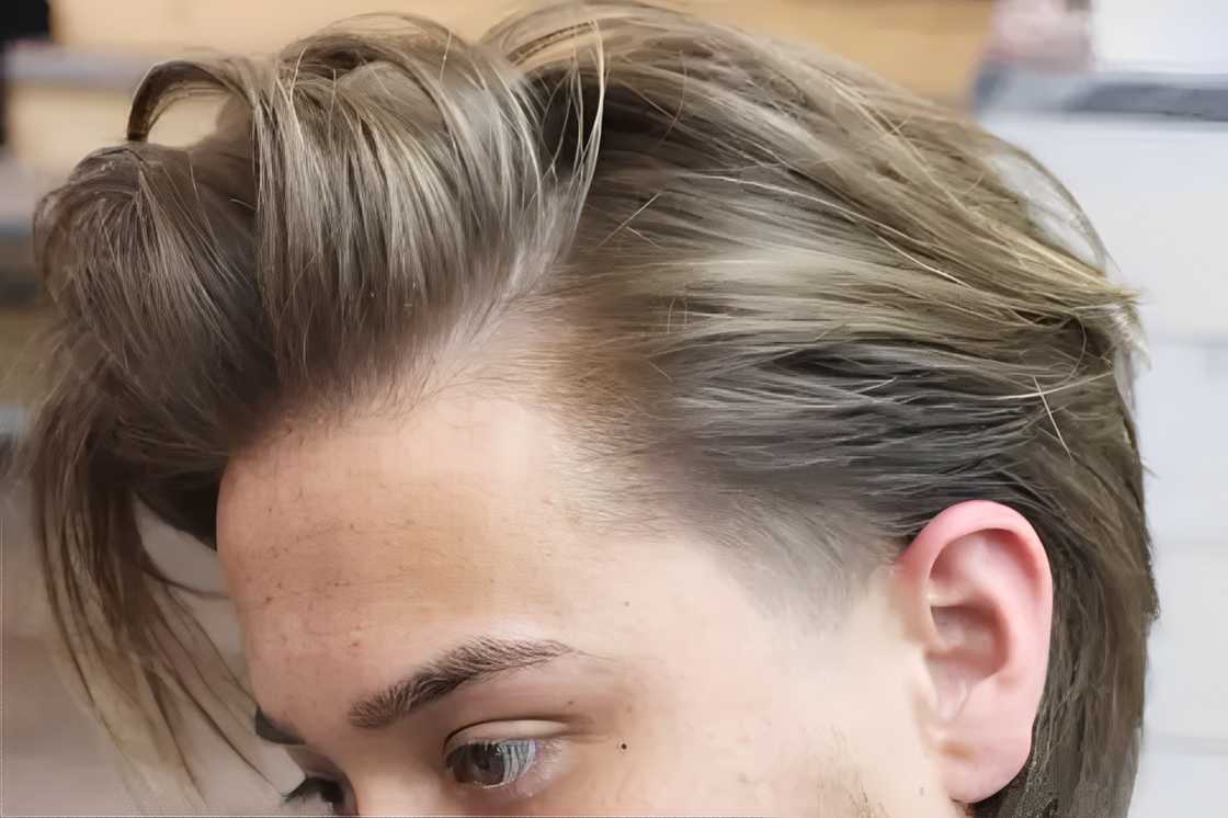 A man rocks a layered bob hairstyle A man rocks a layered bob hairstyle