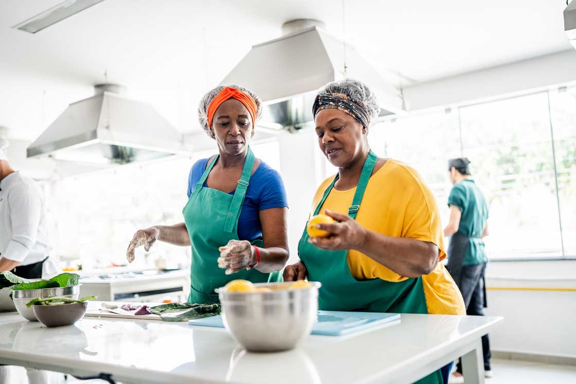 Two women in the kitchen Two women in the kitchen