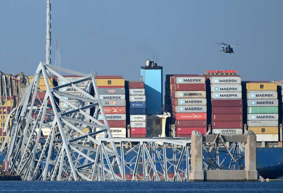 The Francis Scott Key Bridge collapsed into the Patapsco River after being hit by a container ship The Francis Scott Key Bridge collapsed into the Patapsco River after being hit by a container ship