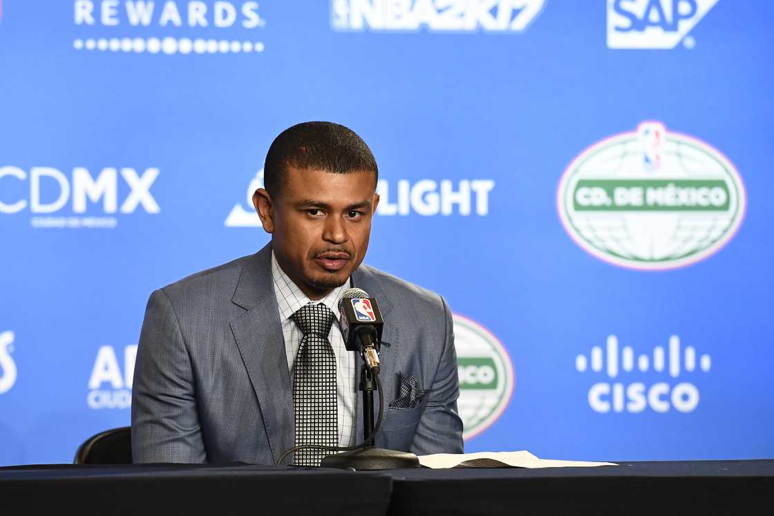 Earl Watson talks to the media during a press conference