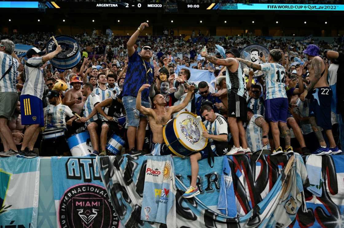 While poor migrant workers watched at a cheaper venue elsewhere in Doha, wealthier Argentina fans celebrated at Lusail Stadium While poor migrant workers watched at a cheaper venue elsewhere in Doha, wealthier Argentina fans celebrated at Lusail Stadium