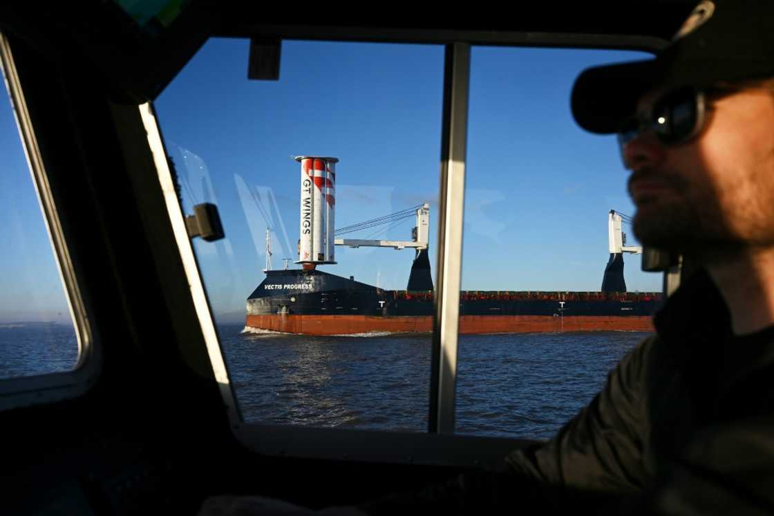 The experimental sail uses wind to help power the cargo ship to reduce fuel use The experimental sail uses wind to help power the cargo ship to reduce fuel use