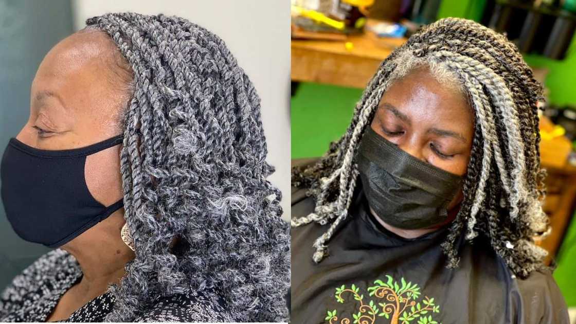 A woman of color wearing Grey kinky twists