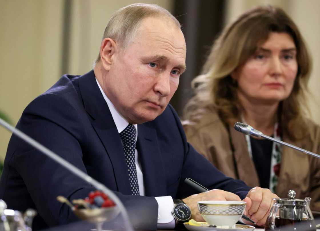 The carefully choreographed meeting took place at Vladimir Putin's residence The carefully choreographed meeting took place at Vladimir Putin's residence