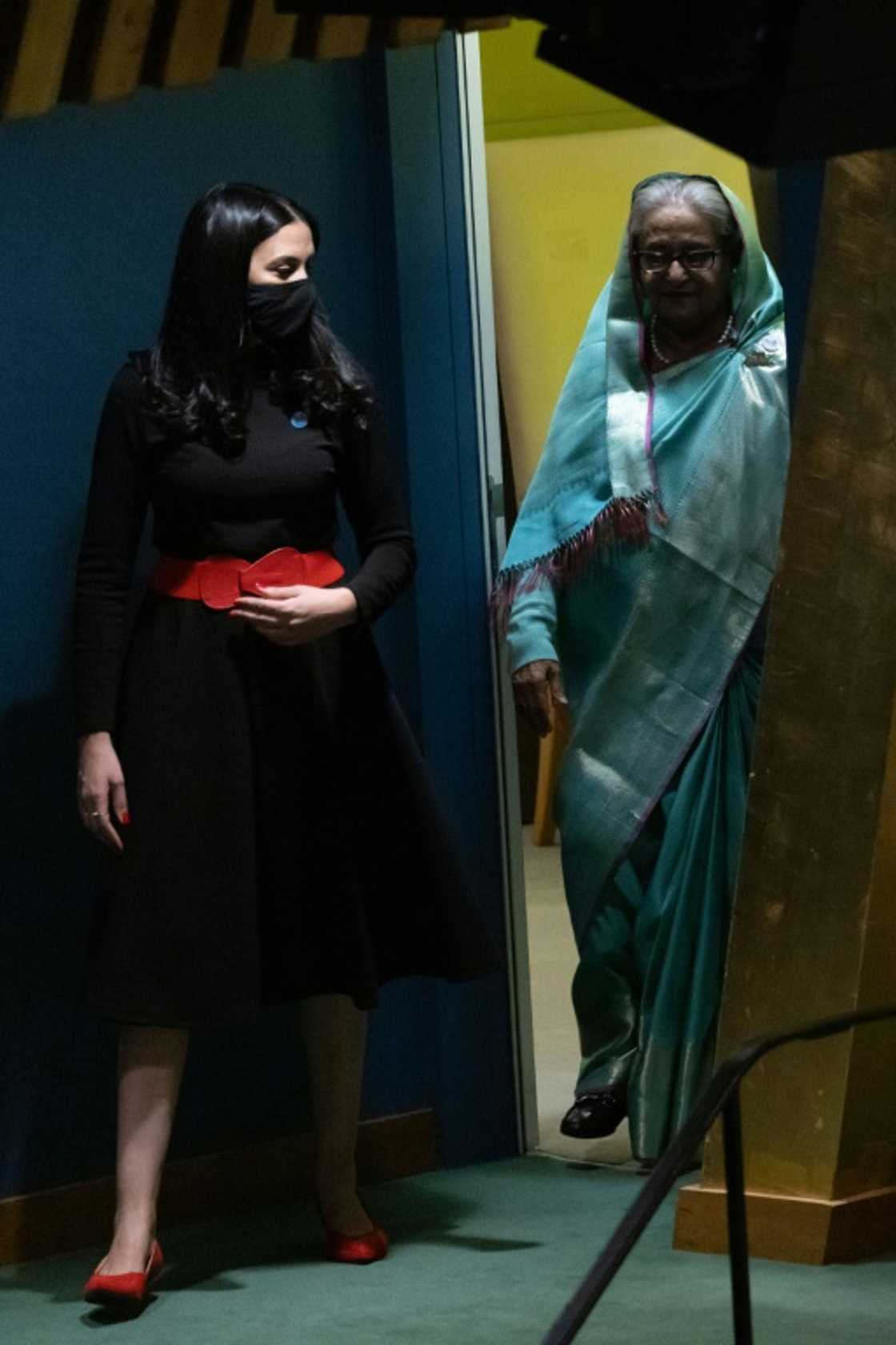Bangladesh's Prime Minister Sheikh Hasina (R) enters to address the 77th session of the United Nations General Assembly at UN headquarters in New York City on September 23, 2022 Bangladesh's Prime Minister Sheikh Hasina (R) enters to address the 77th session of the United Nations General Assembly at UN headquarters in New York City on September 23, 2022