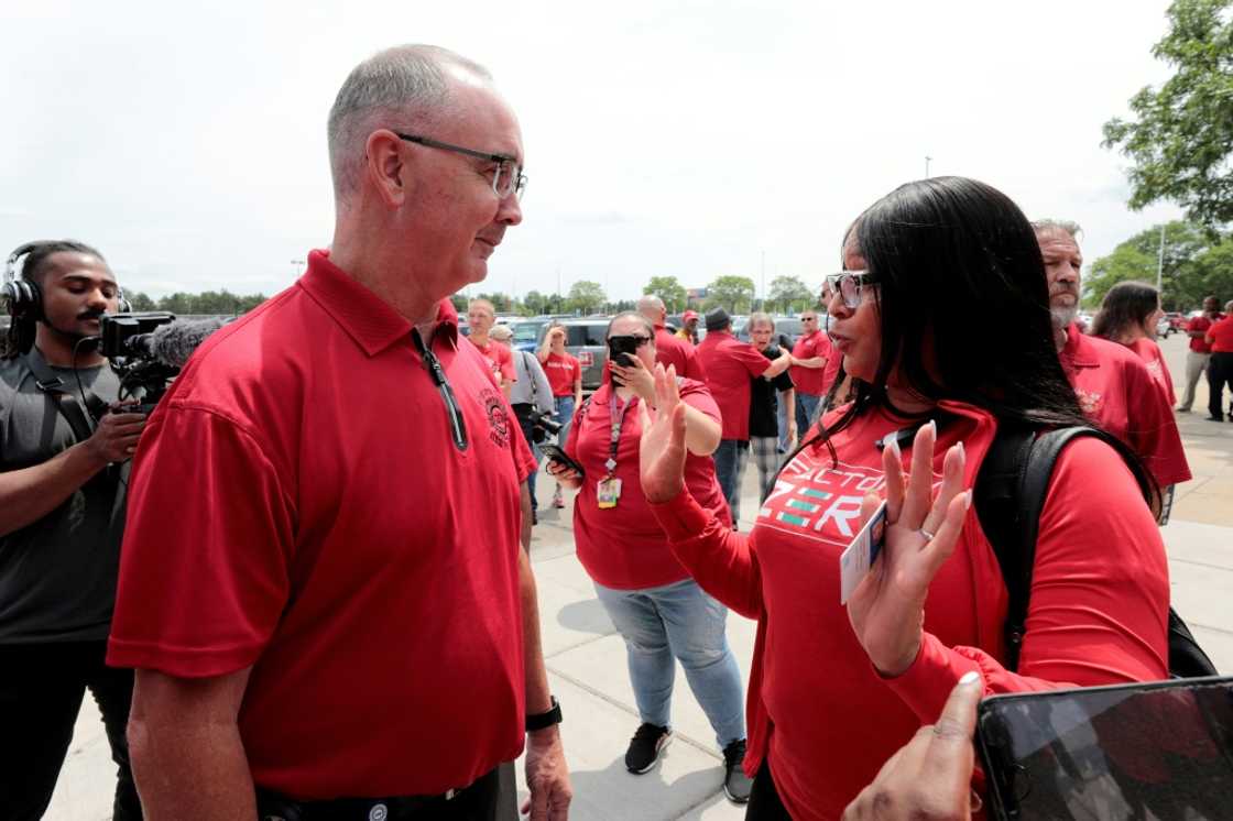 Earlier this month, UAW President Shawn Fain shunned the symbolic handshake with car executives to kick off negotiations and instead spoke with workers Earlier this month, UAW President Shawn Fain shunned the symbolic handshake with car executives to kick off negotiations and instead spoke with workers