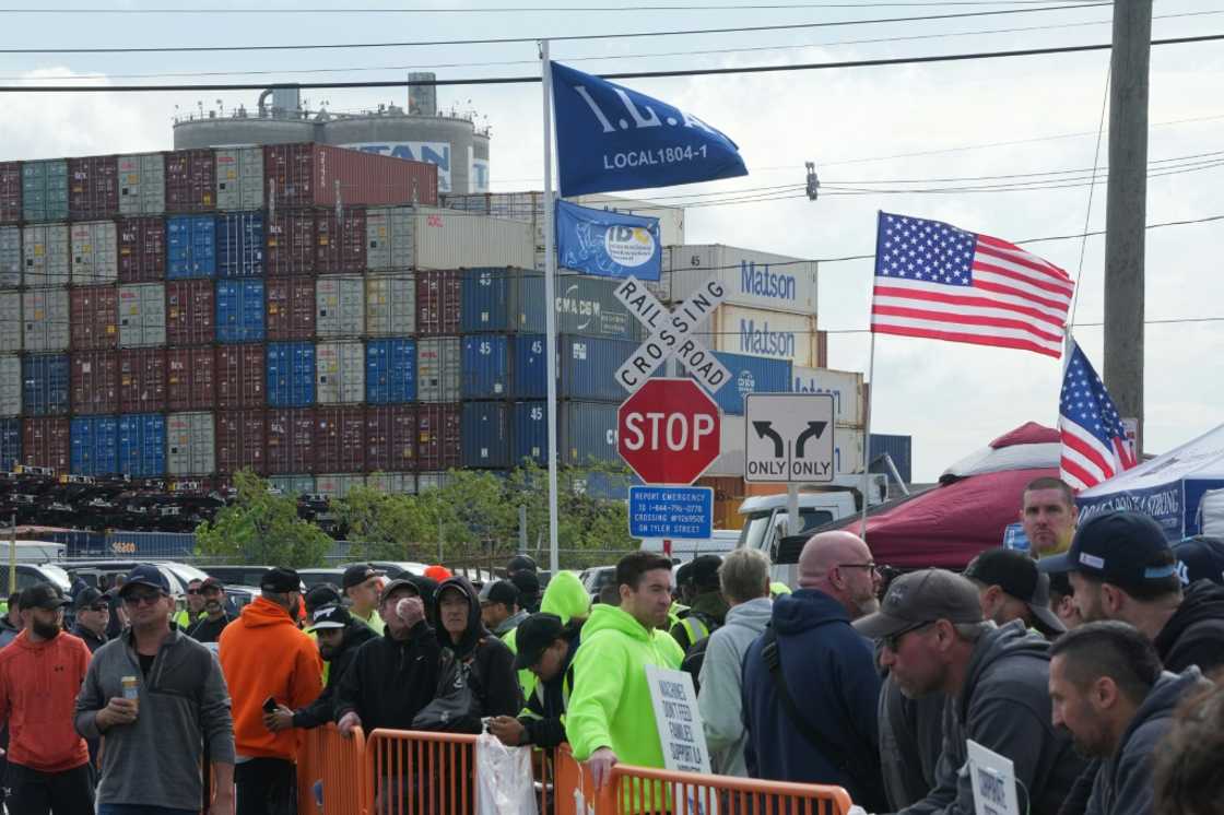 Shipping containers are stacked as dockworkers are on strike in Port Newark on October 1, 2024 in New Jersey