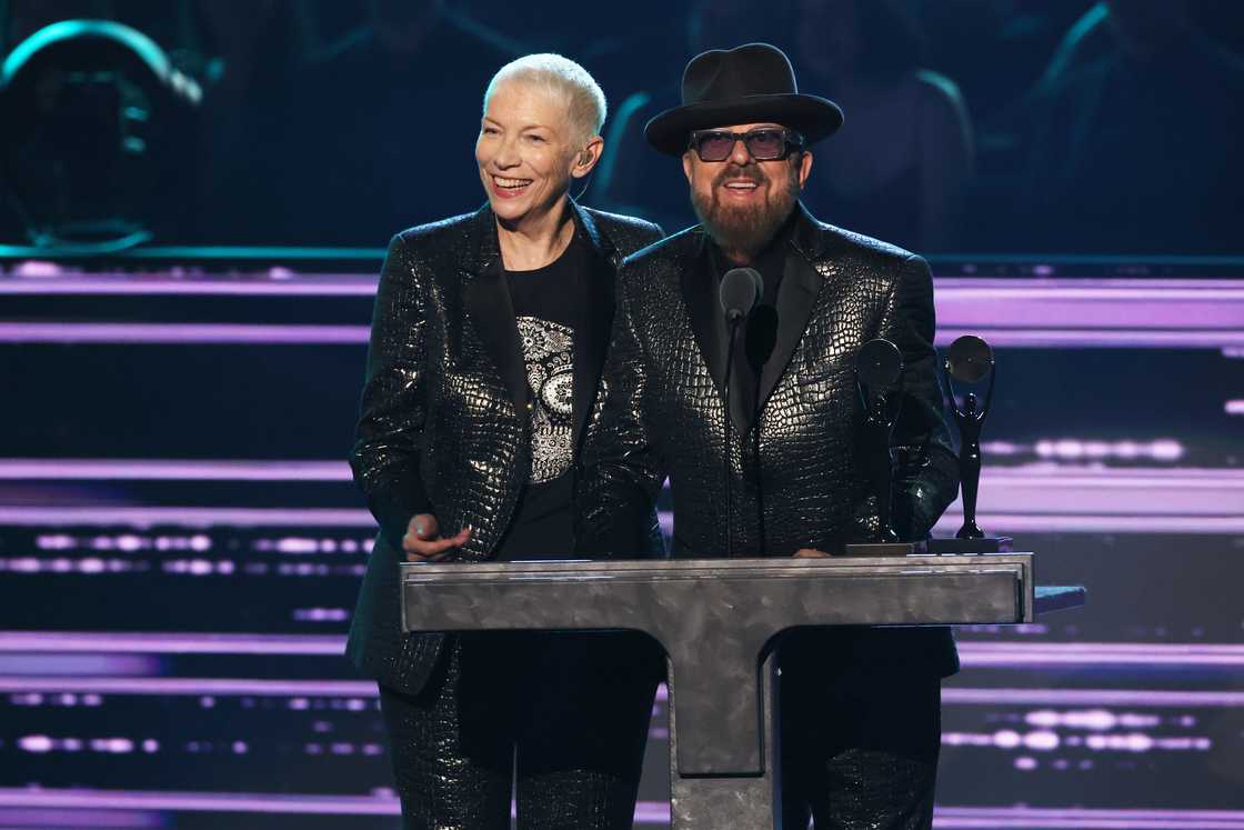 Annie Lennox (L) and Dave Stewart (R) of Eurythmics speak onstage during the 37th Annual Rock & Roll Hall of Fame Induction Ceremony. Annie Lennox (L) and Dave Stewart (R) of Eurythmics speak onstage during the 37th Annual Rock & Roll Hall of Fame Induction Ceremony.