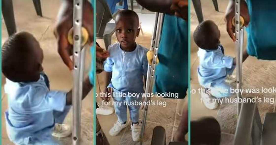 Little boy approaches physically challenged man to search for his legs Little boy approaches physically challenged man to search for his legs