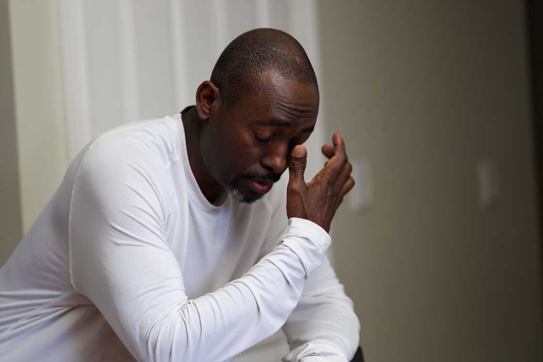 A black man crying A black man crying