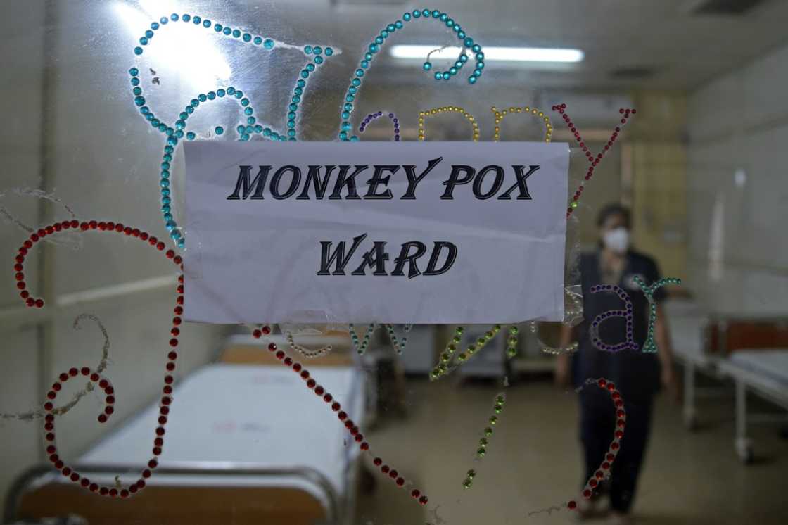 A health worker walks inside an isolation ward built as a precautionary measure for monkeypox patients at a civil hospital in Ahmedabad, India A health worker walks inside an isolation ward built as a precautionary measure for monkeypox patients at a civil hospital in Ahmedabad, India