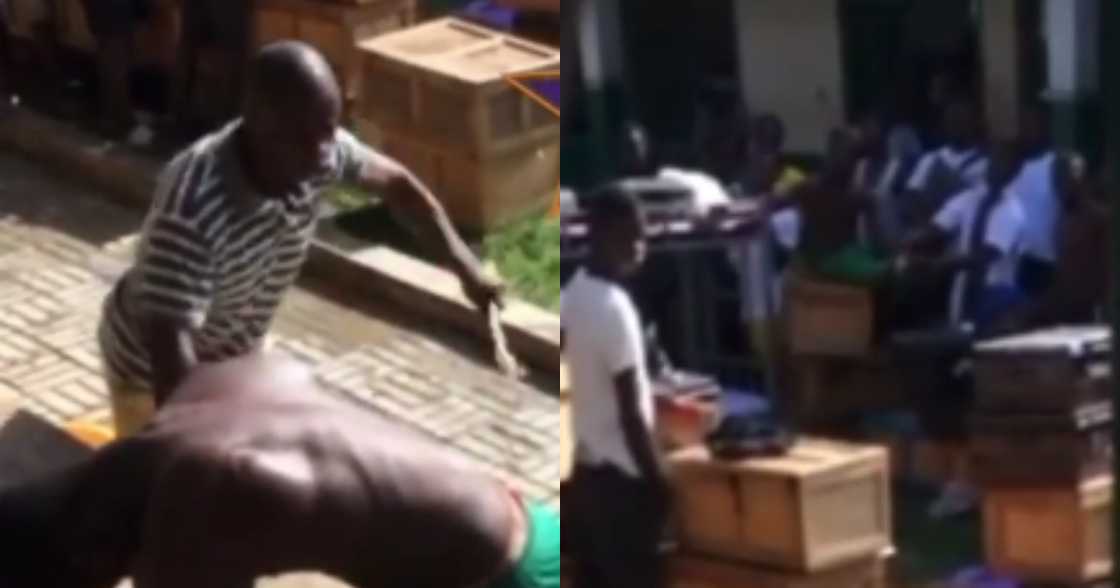 Hard guy: SHS student boldly poses for canes as housemaster whips him 25 times in video