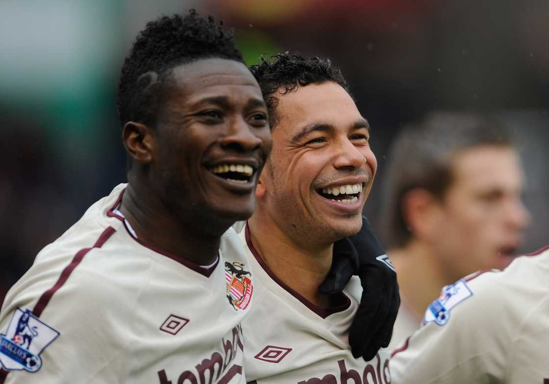 Kieran Richardson of Sunderland celebrates scoring to make it 1-0 with team mate Asamoah Gyan during the Barclays Premier League match between Stoke City and Sunderland at the Britannia Stadium on February 5, 2011 in Stoke on Trent, England Kieran Richardson of Sunderland celebrates scoring to make it 1-0 with team mate Asamoah Gyan during the Barclays Premier League match between Stoke City and Sunderland at the Britannia Stadium on February 5, 2011 in Stoke on Trent, England