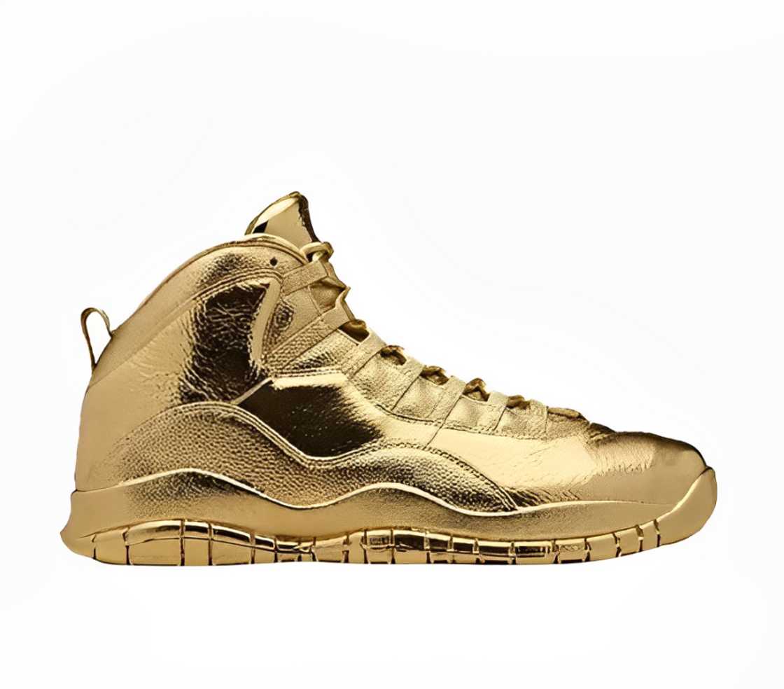 Solid Gold OVO x Air Jordan is on a white background