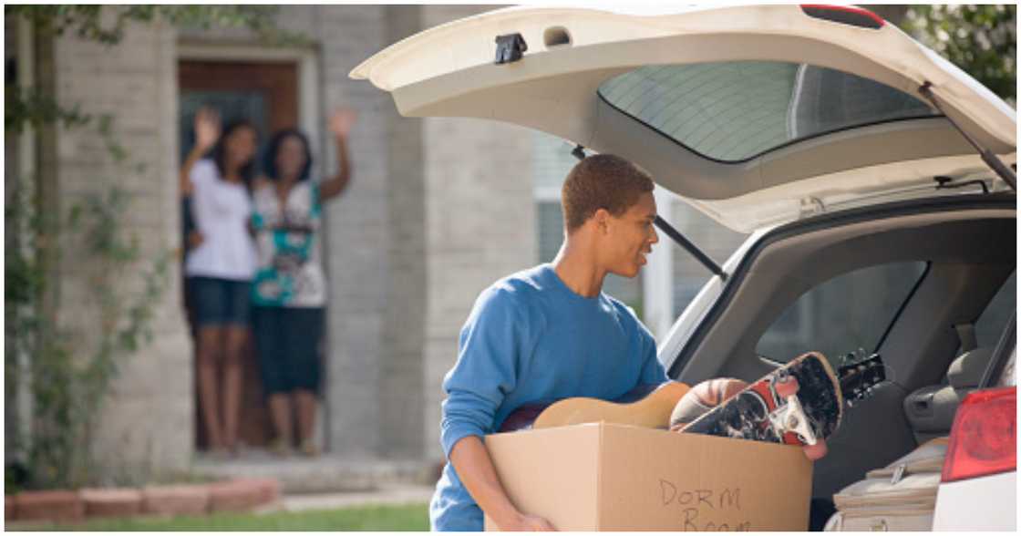 A young man moves out of his parents' house