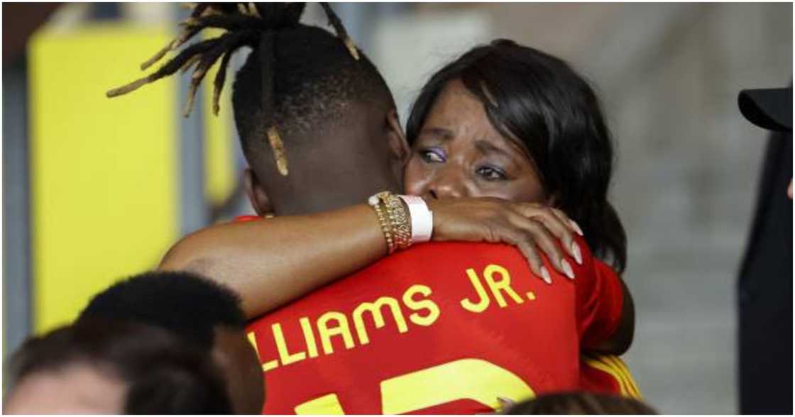 Nico Williams and his mother. Nico Williams and his mother.