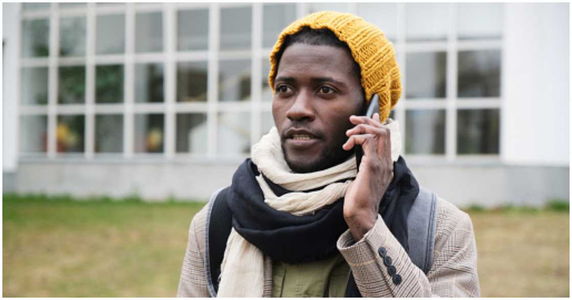 A man abroad calls relatives back home to buy a house