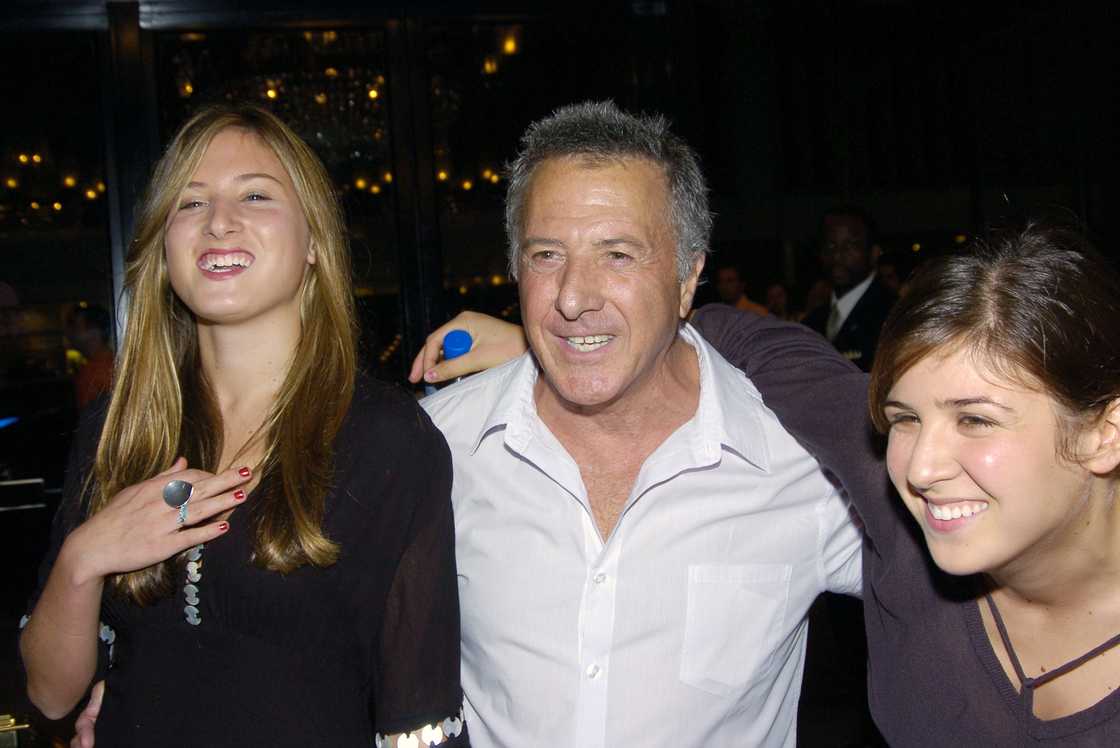 Dustin and his daughters, Ali (left) and Becky, are seen at the Ziegfeld Theater. Dustin and his daughters, Ali (left) and Becky, are seen at the Ziegfeld Theater.