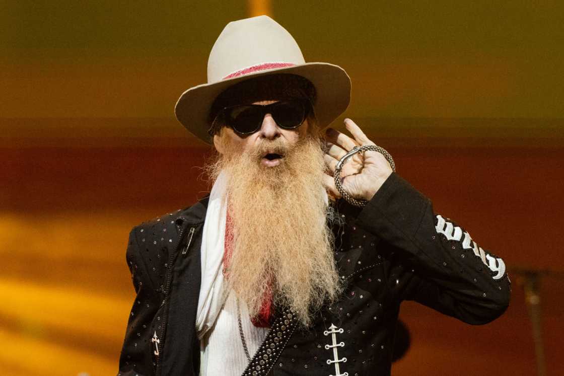 Billy F. Gibbons of ZZ Top performs onstage during the Jim Irsay Collection Exhibit and Concert Billy F. Gibbons of ZZ Top performs onstage during the Jim Irsay Collection Exhibit and Concert