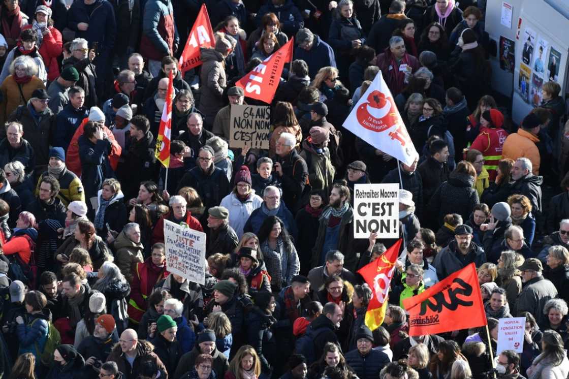 Protesters marched throughout France on Tuesday against President Emmanuel Macron's proposed pension reform Protesters marched throughout France on Tuesday against President Emmanuel Macron's proposed pension reform