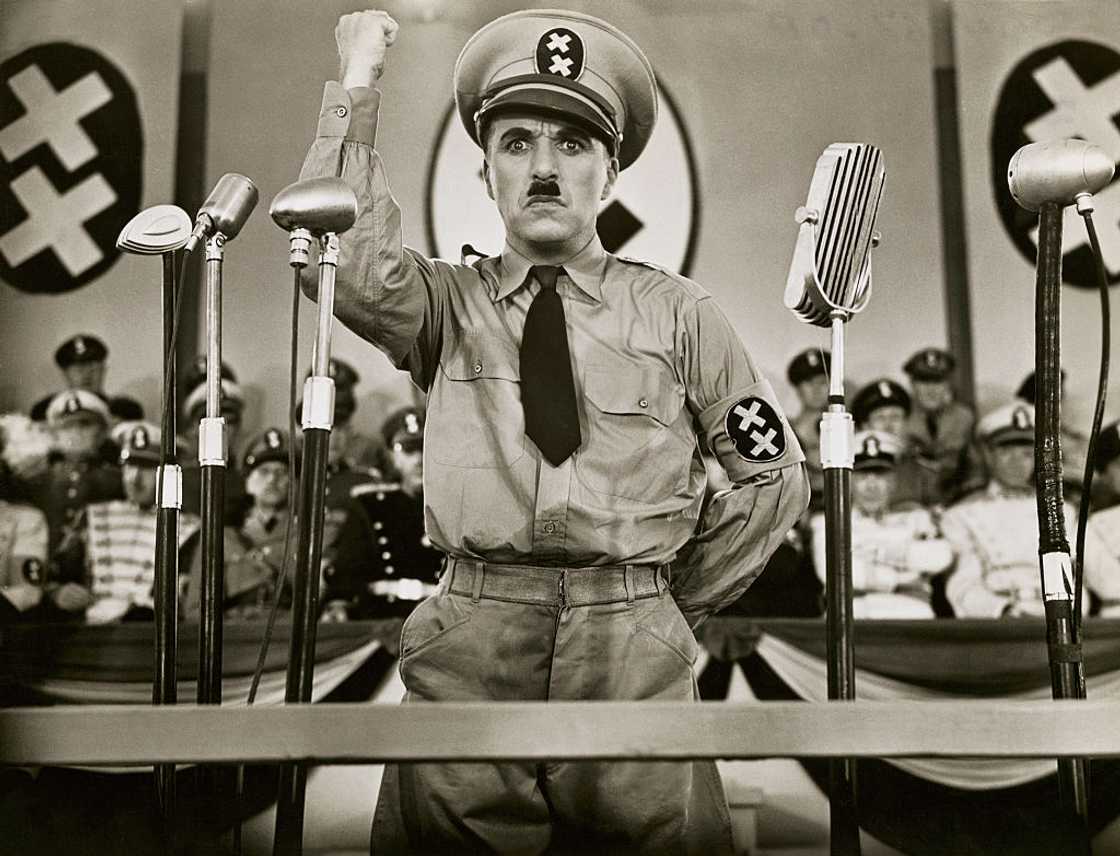 Charlie Chaplin acting as a dictator Charlie Chaplin acting as a dictator